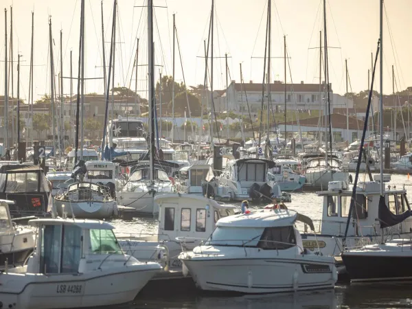 Port with boats near Roan camping Le Domaine de Beaulieu.
