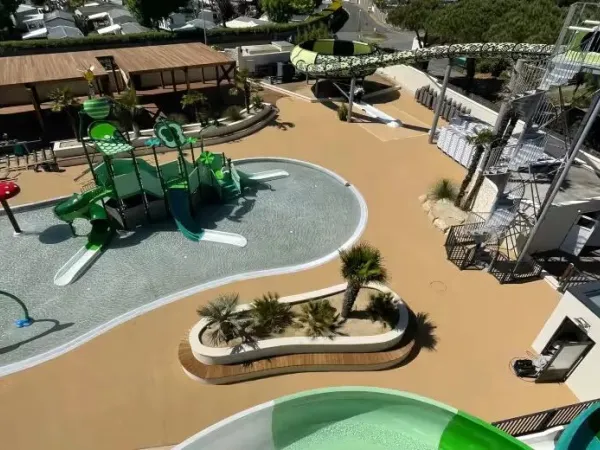 Overview of the new children's playground and spacebowl toll slide at Roan campsite Le Domaine du Clarys.