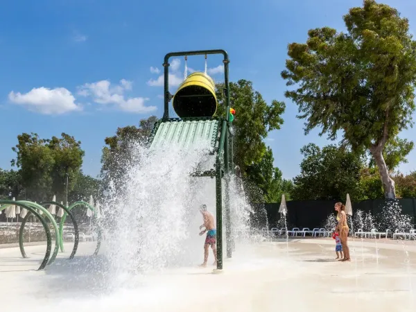 Children at the spray park at Roan camping hu Fabulous village.