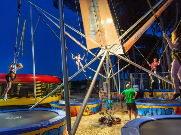 Kids on the trampolines at Roan camping hu Fabulous Village.