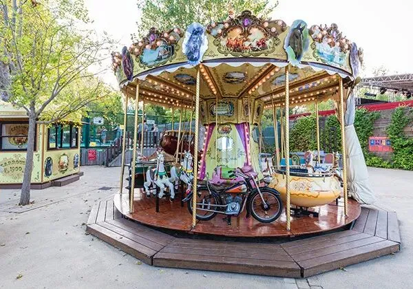 Small carousel at Roan camping Le Serignan Plage.