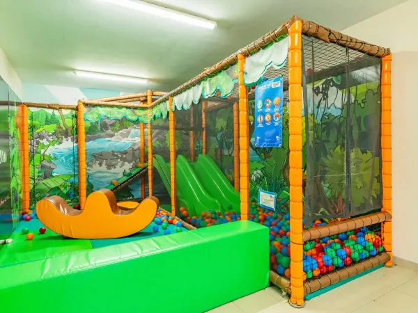 Indoor play area for the little ones at Roan camping Domaine de Massereau.