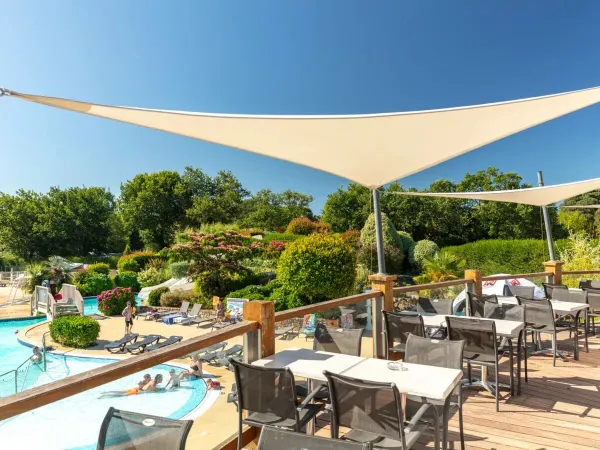 Nice view from the terrace over the pool at Roan campsite La Grande Métairie.