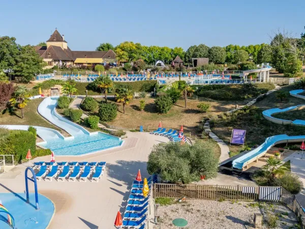 Swimming pool with monastery in the background at Roan campsite Saint Avit Loiris.