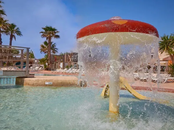 Mushroom spray in the children's pool at Roan campsite Le Petit Mousse.