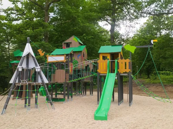 A fun playground with slide at Roan camping Le Lac des Vieilles Forges.