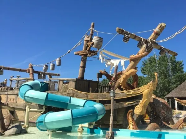Pirate ship with slides and sprayers at Roan campsite Les Sables d'Or.