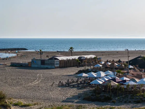 The beach with bar at Roan campsite Les Sables d'Or.