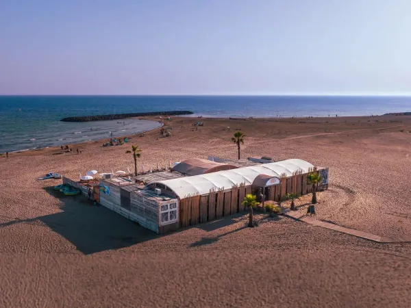 Beach and bar at Roan campsite Les Sables d'Or.