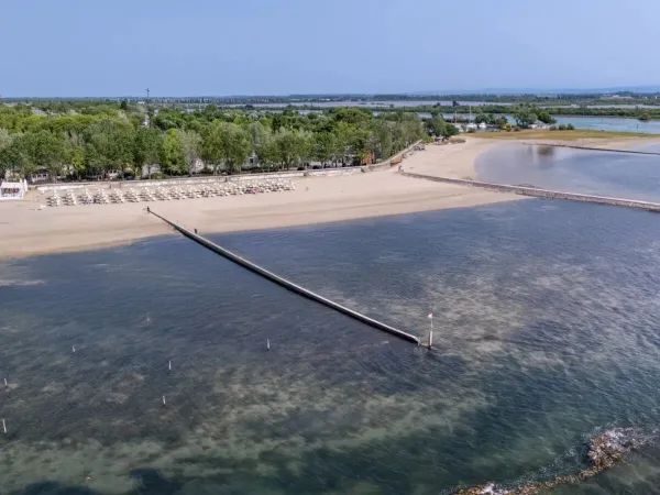 Aerial view of the sea and beach at Roan campsite Tenuta Primero.