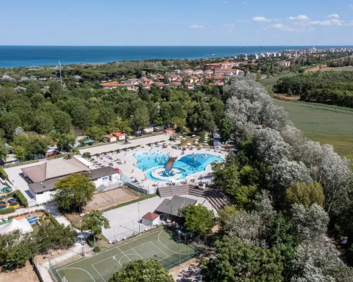 Drone shot of the swimming pool at Roan camping Adriano Village.