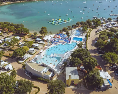 Drone shot of the swimming pool at Roan camping Vestar.