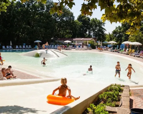 Swimming pool at Roan camping hu I Pini village.