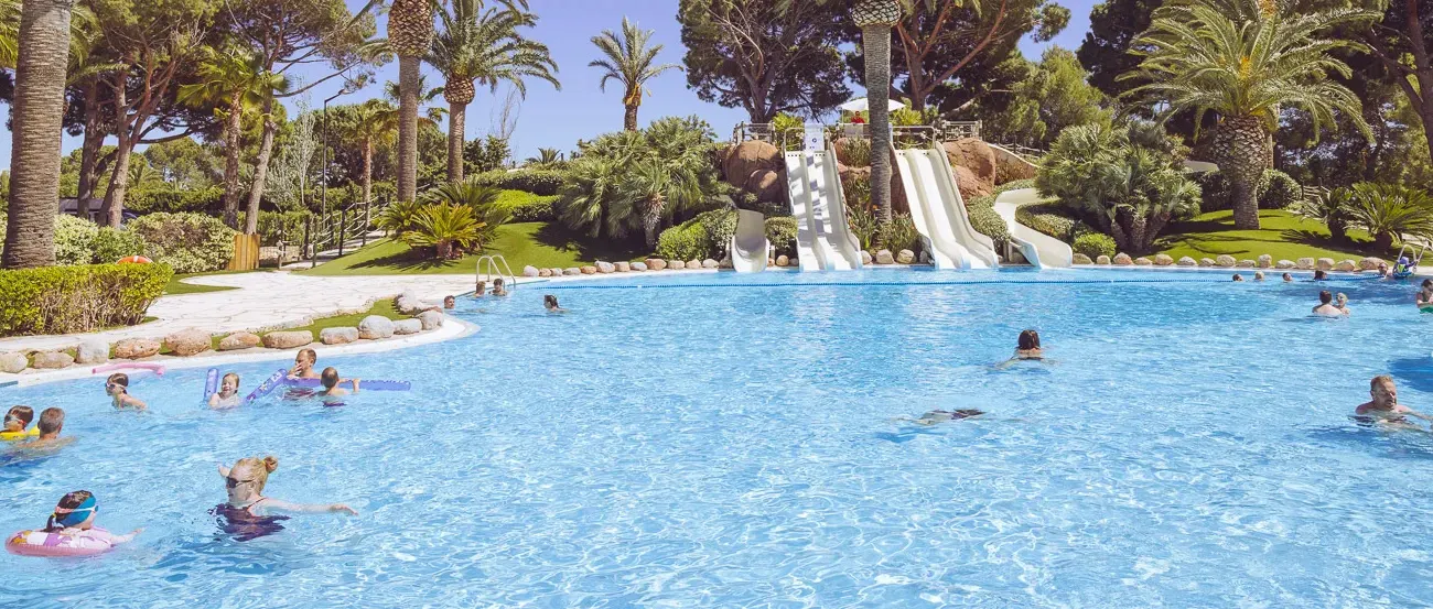 Swimming pool with slides at Roan campsite Playa Montroig.