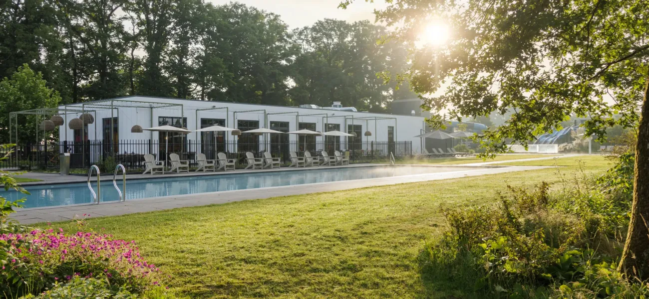Camping De Twee Bruggen's luxurious outdoor pool and wellness facilities.